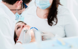 CEI dentists putting in dental abrasive disk